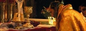 priest saying mass