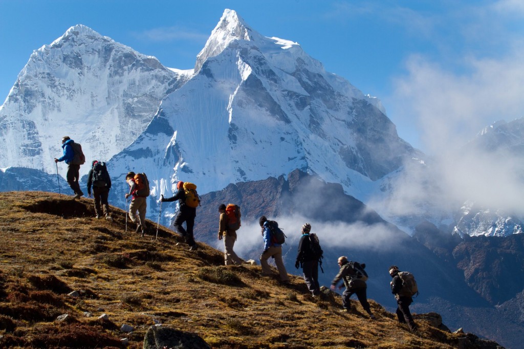 Soldiers to the Summit team trekking above Pherich in the shadow of Ama Dablam. Photo by Didrik Johnck