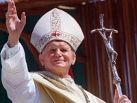 Pope John Paul II waves to the wellwisher 28 April