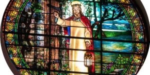Anselm - Lord God I Am Dazzled by Your Light stained glass of Christ knocking at the door