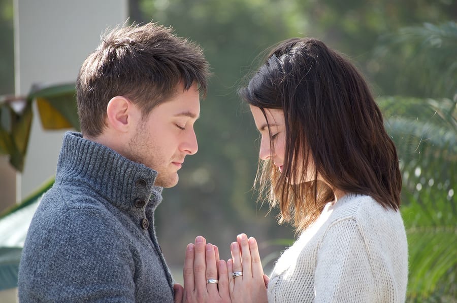 belief or faith prayingcouple