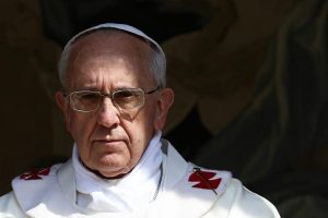 pope francis serious face surrounded by darkness Historical Perspective on the Current Corruption Crisis