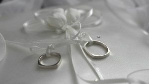 ring rings pillow tied white