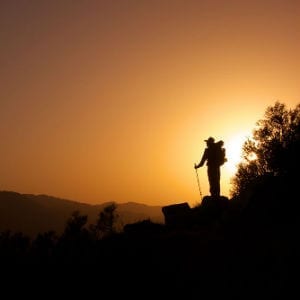 sunset hiker masonry evening dusk walking stick hike walk