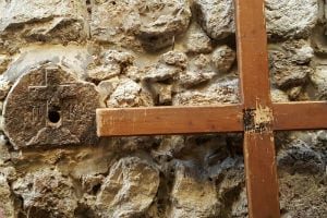 wood cross via dolorosa wall hole