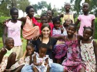 Katie Davis & her 13 adopted children mercy charity blessed are the merciful sacrifice gregory of nazianzen generosity