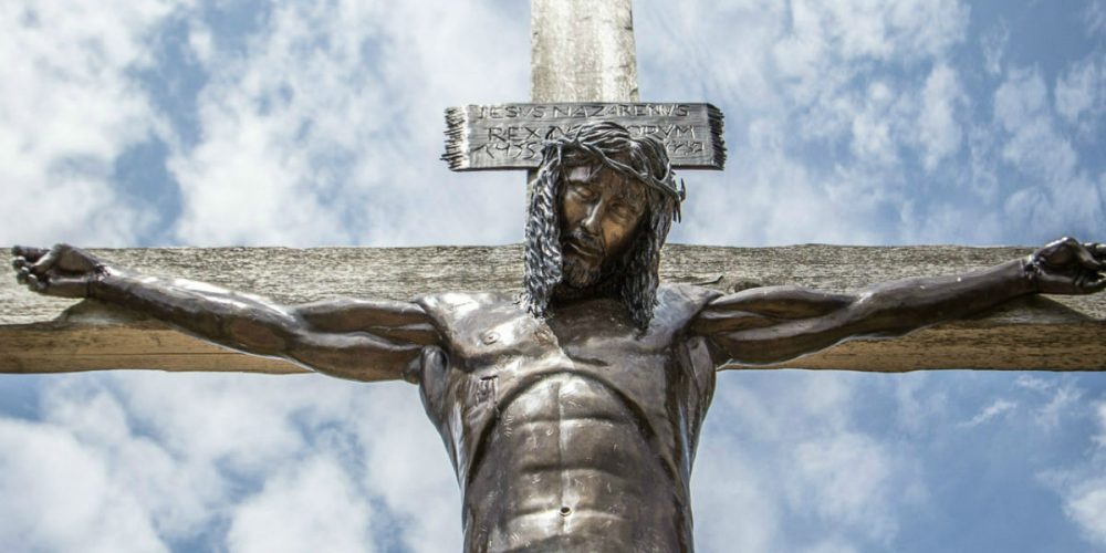 jesus on cross bronze meaning of the cross facebook Crossroads Initiative