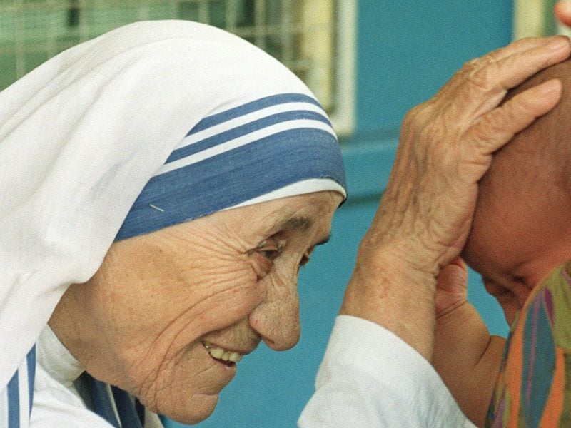 mother teresa blessing a baby facebook