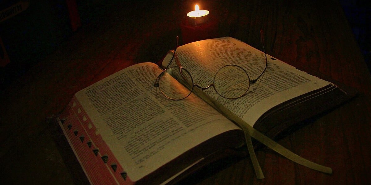 candle light reading the bible Sias van Schalkwyk