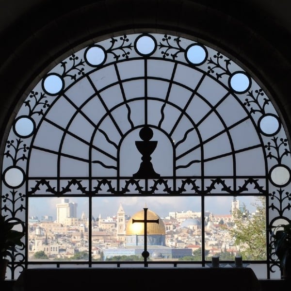 Jerusalem through a window palm sunday road dominus flevit hosanna donkey