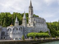The Basilica of Lourdes at Gave de Pau river