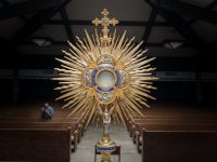 Eucharist host monstrance adoration